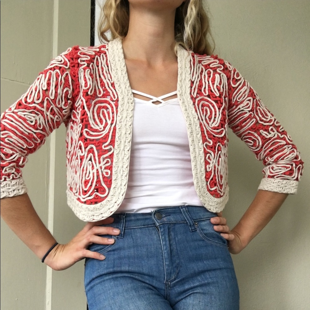 Crocheted red and white cropped cardigan