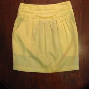 Shiny golden yellow mini skirt