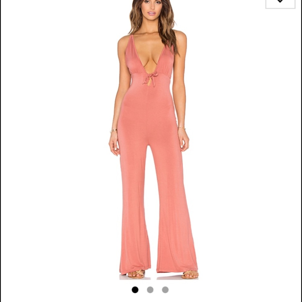 PRICE FIRM NWT rust plunging jumpsuit