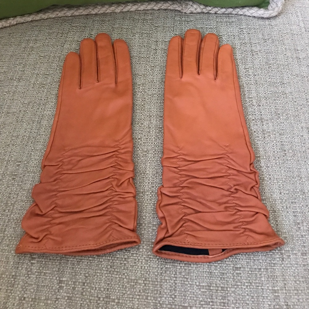 Beautiful orange leather gloves