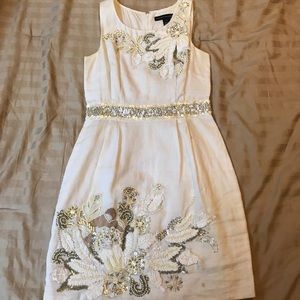 White linen dress with beading