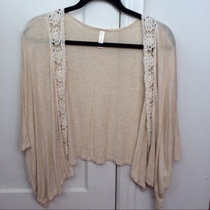 Cream colored kimono with lace edges