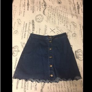 Denim skirt with scalloped edges