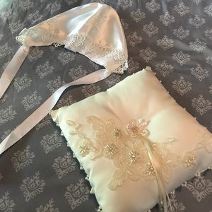Baptism bonnet and ring pillow.