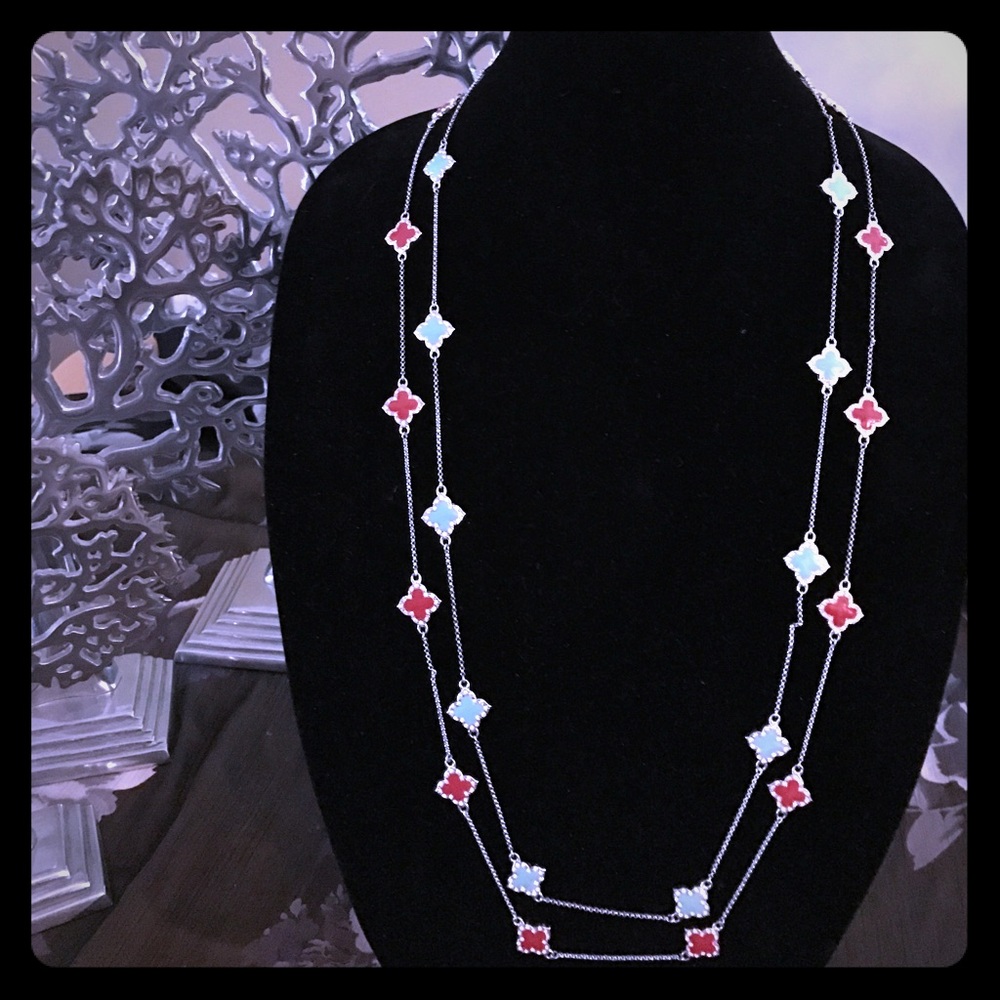 2 beautiful clover style enamel & cubic zirconia necklaces. Sold separately.