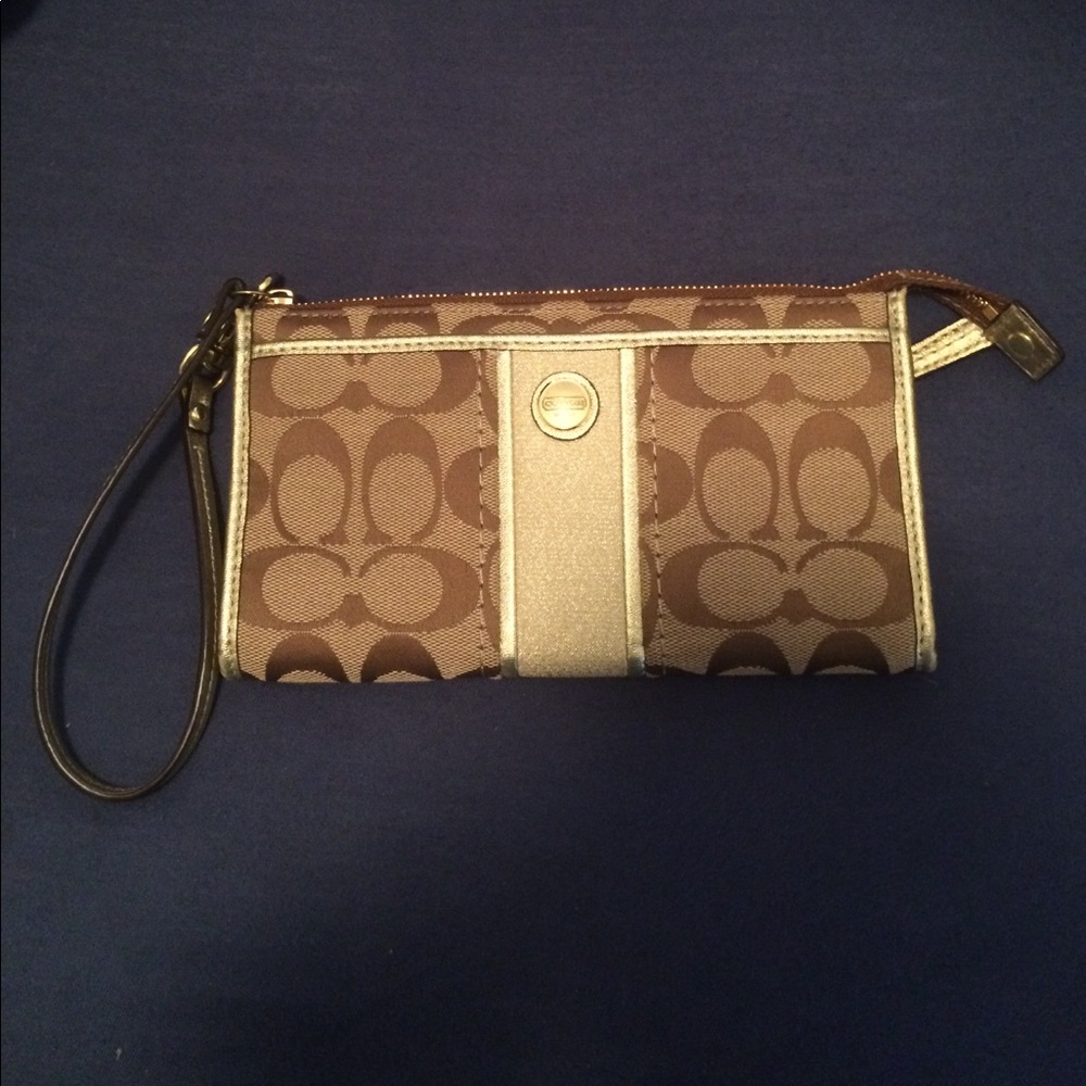 Gold coach wristlet
