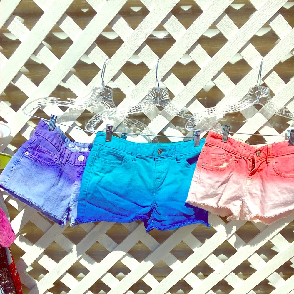 Three pairs of Ombré shorts.