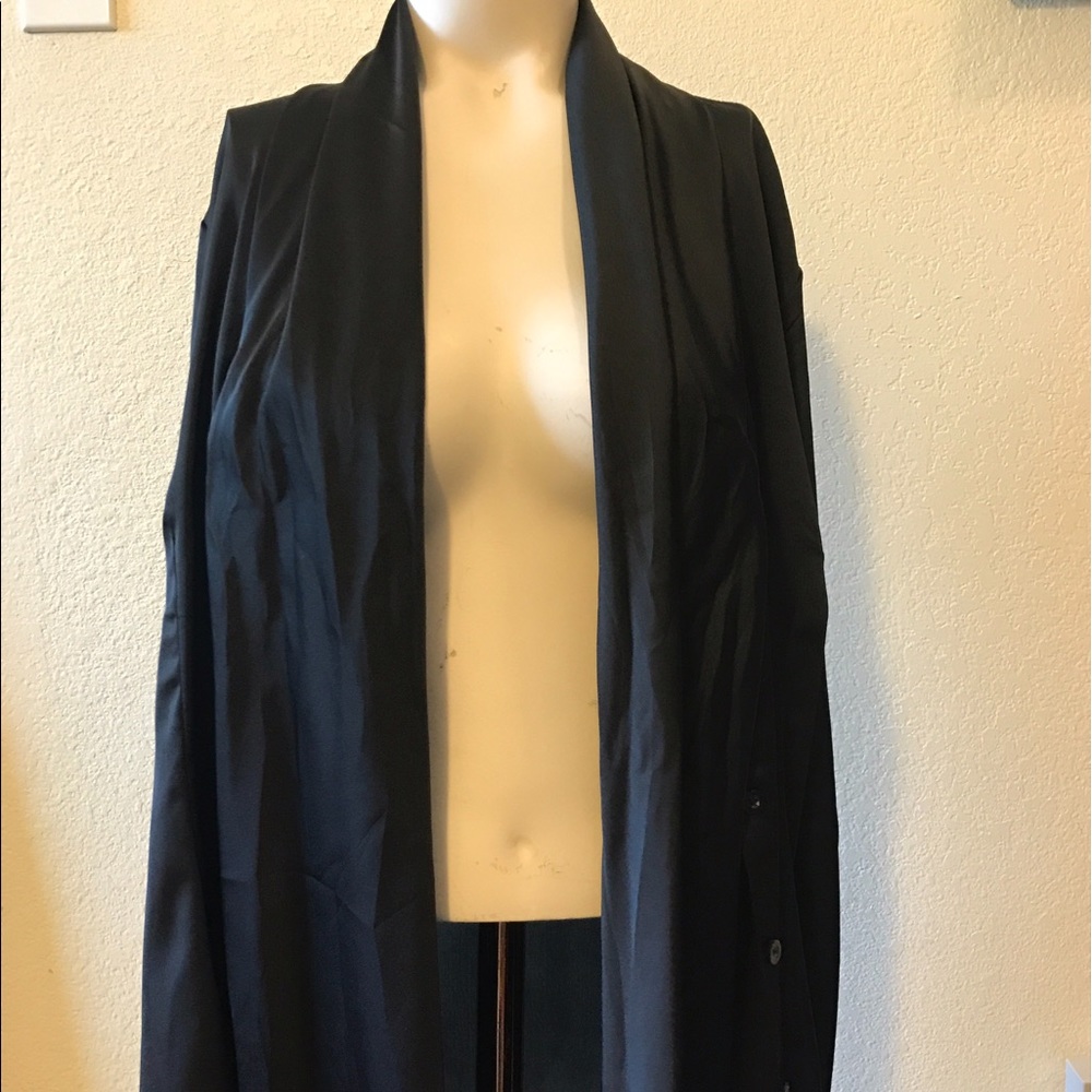 A sheer black cardigan
