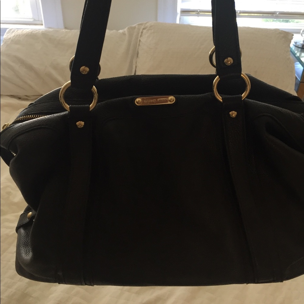 Micheal Kors bag less than 2 years old