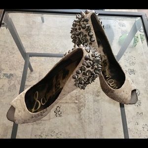 Ivory snakeskin + hardware peep toe pumps