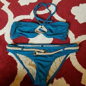 **SOLD** Bare assets teal