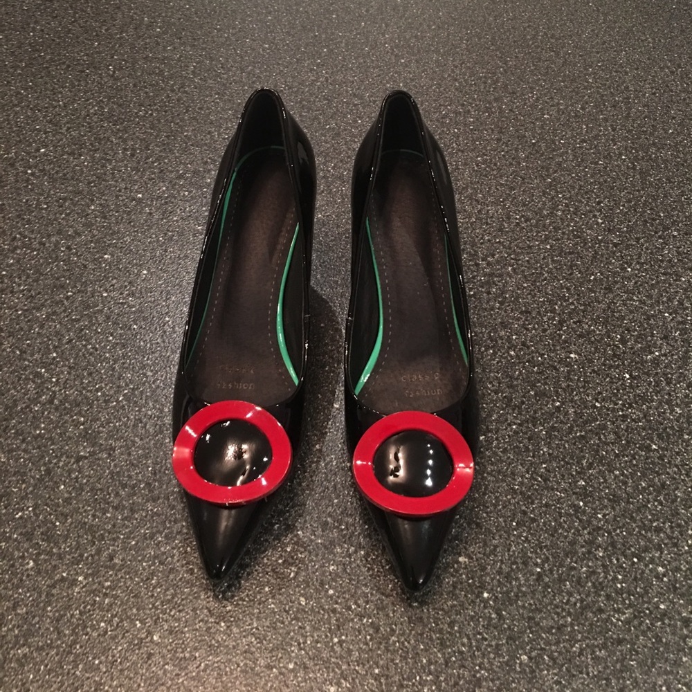 Brand new black shoes with red buckle