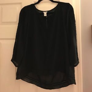 Black top with lace shoulder detail