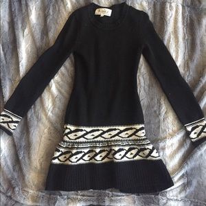 Women's black and white sweater dress.