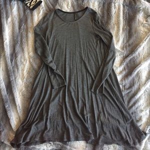 Long-sleeved gray mini dress.