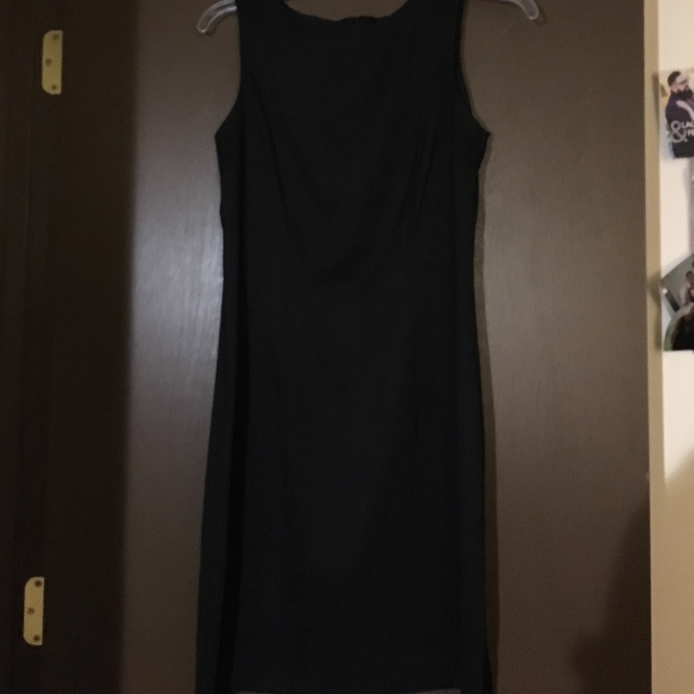 Sleeveless black pencil dress