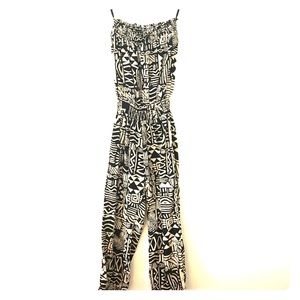 Strapless 80's-patterned jumpsuit.