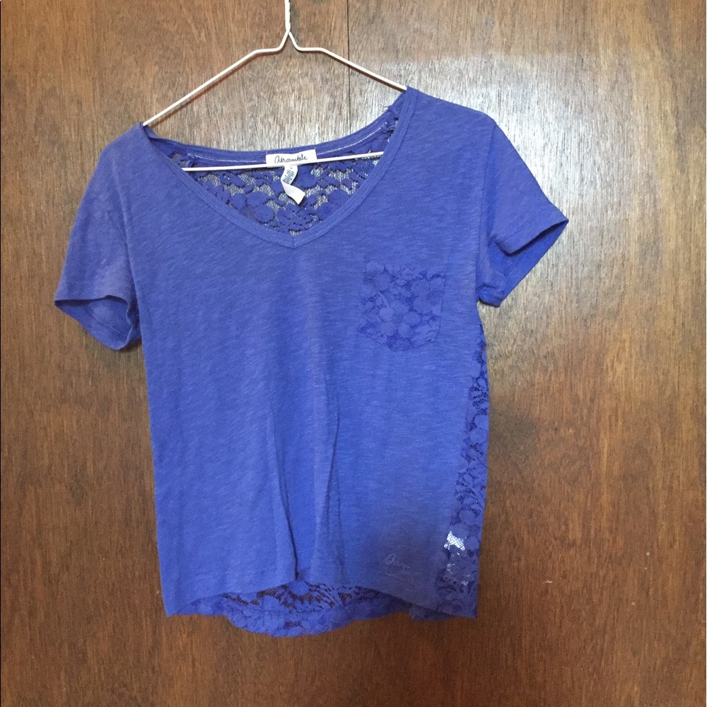 Blue Shirt with flower pattern on the back