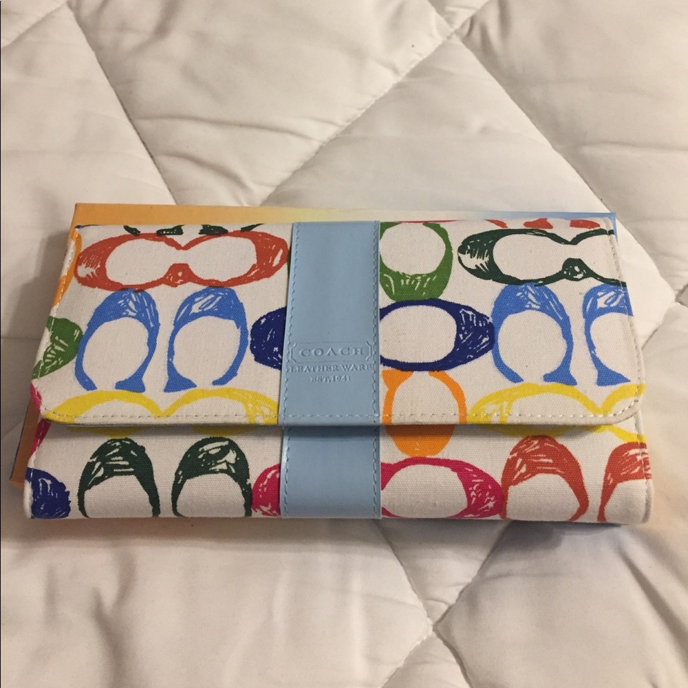Tri fold wallet with removable checkbook holder