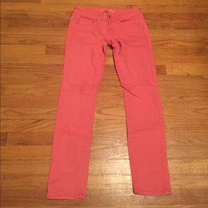 American Eagle pink skinny jeans