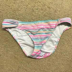 Bikini bottom, size Large,striped, with sequins.