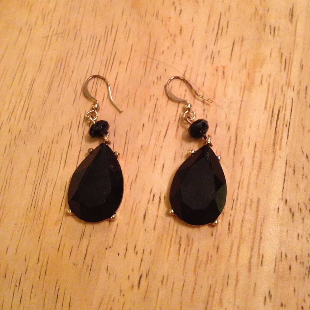 Black dangle gold toned earrings