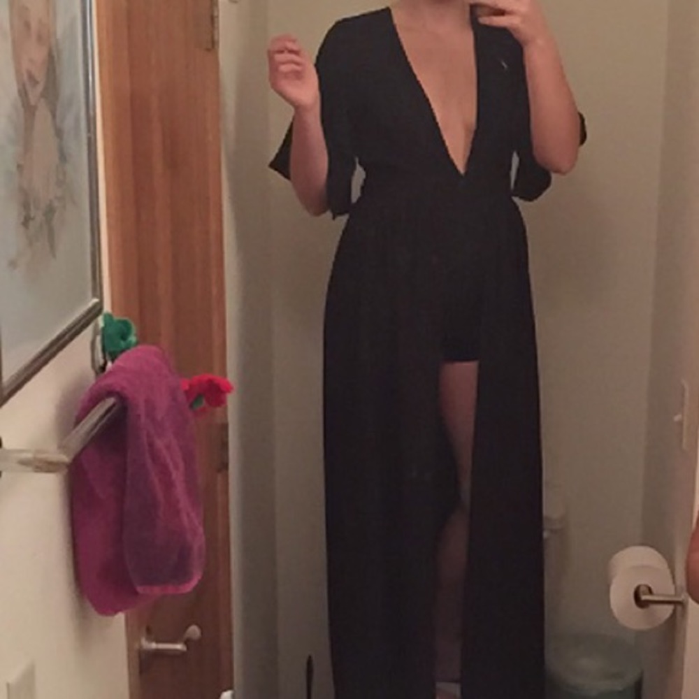 Black romper/dress. Low front w/ open back.