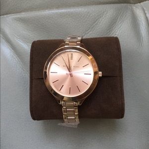 Brand new Michael Kors rose gold watch