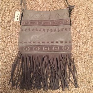 Gray handbag with fringe