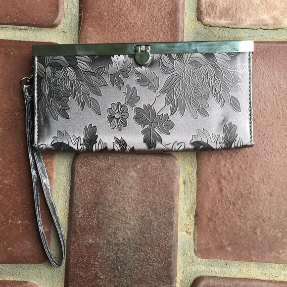 Charming Charlie Handbags - Elegant Metallic Silver Wristlet
