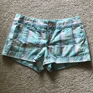 Cuffed plaid shorts