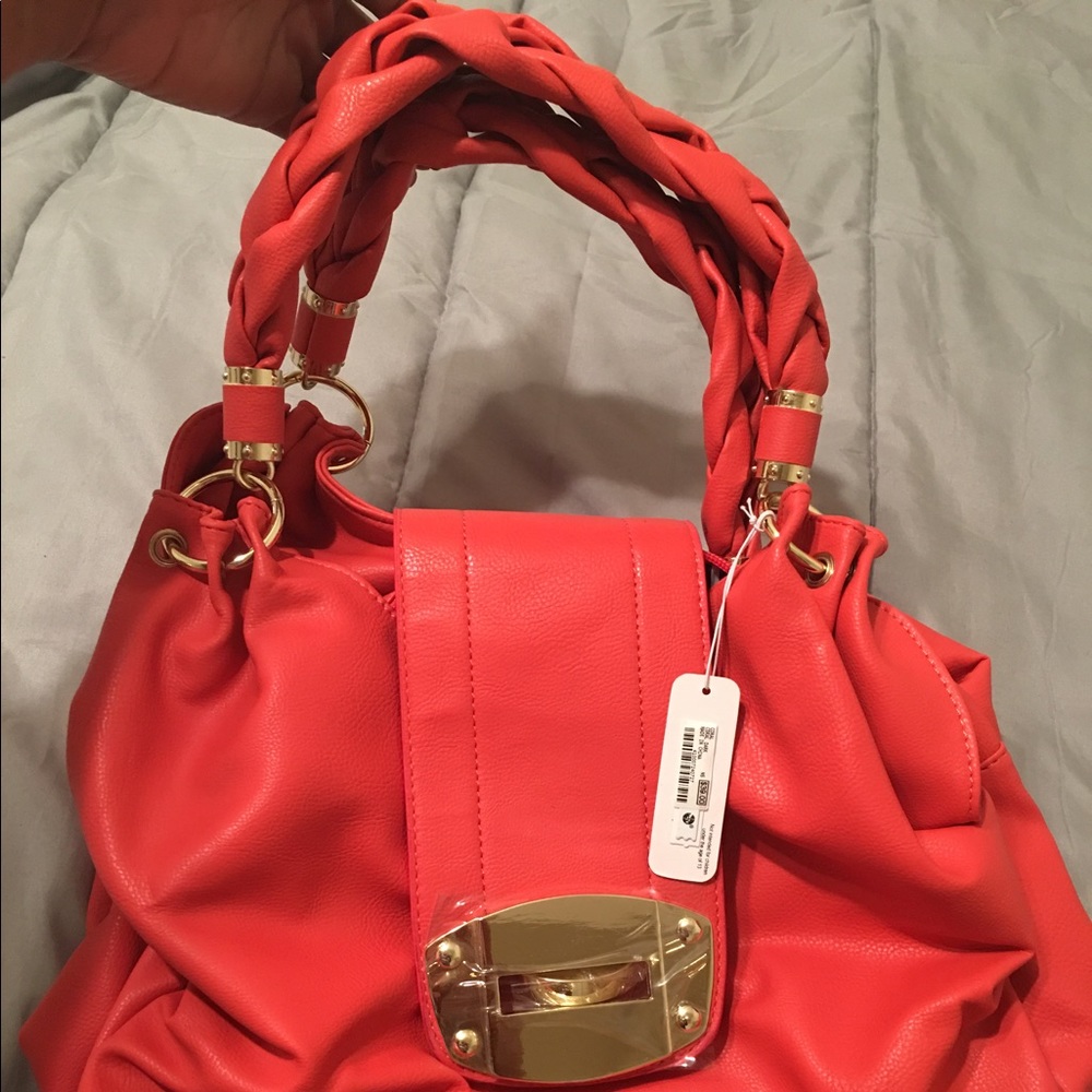 NWT Charming Charlie orange bag.