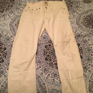 Authentic True Religion Men's white jeans.