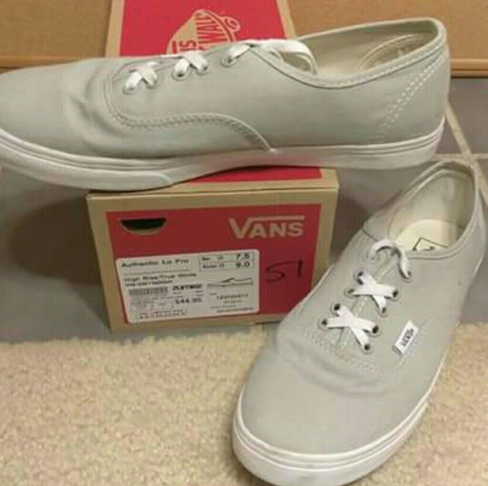 Greyish/white vans