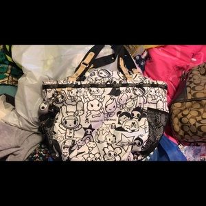 Toki doki purse le sport