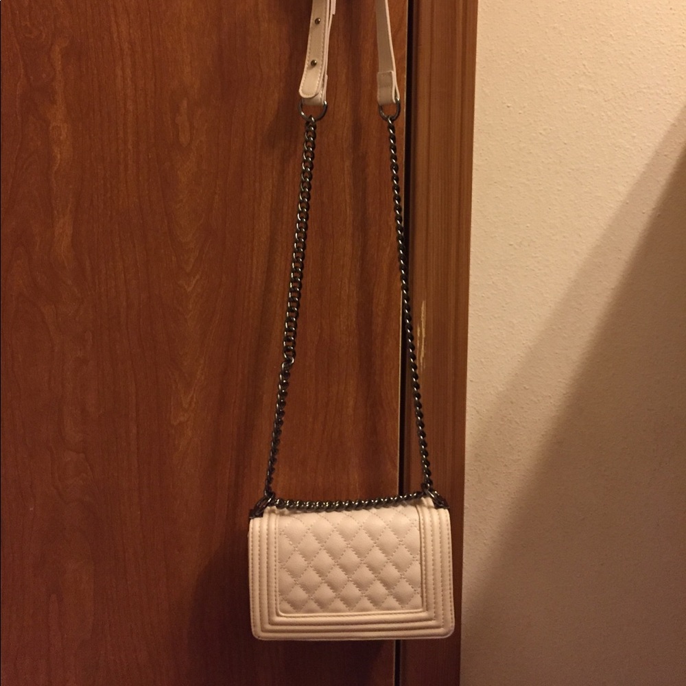Cream clutch w/ steel hardware