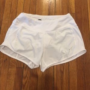 White Nike shorts
