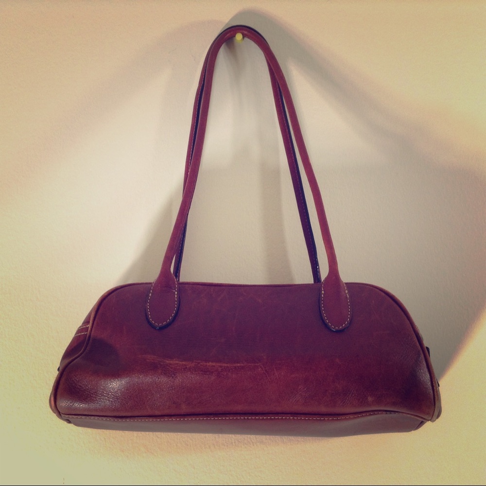 A. Gionnetti women's barrel style leather bag