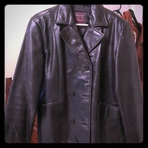 Leather double breasted jacket .