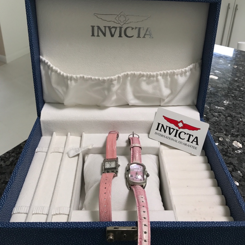 Two Invicta watches in an Invicta jewelry box