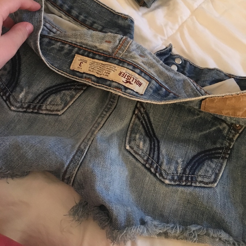 Light colored Hollister frayed jean shorts