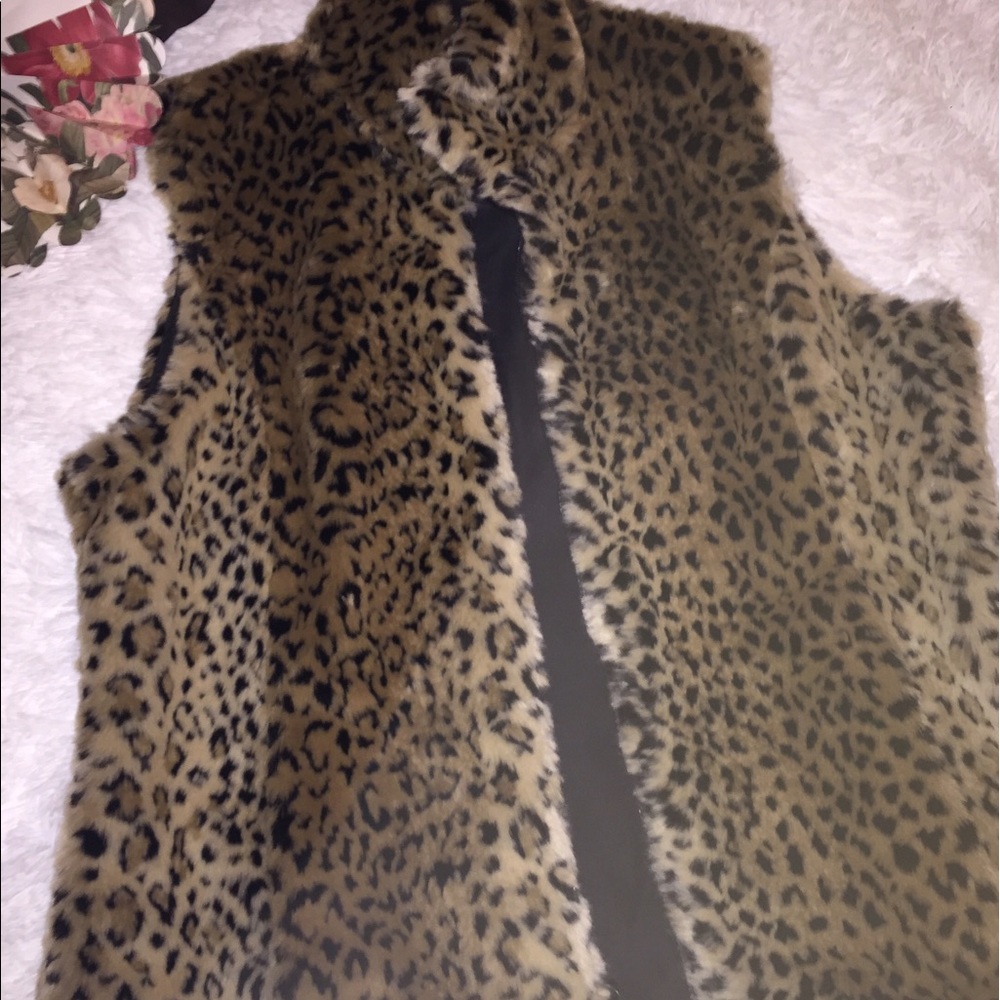 Reversible faux fur vest. Never worn leopard