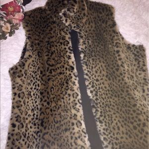 Reversible faux fur vest. Never worn leopard