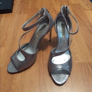Nina high silver heels.