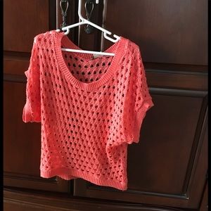 Peach colored knit top
