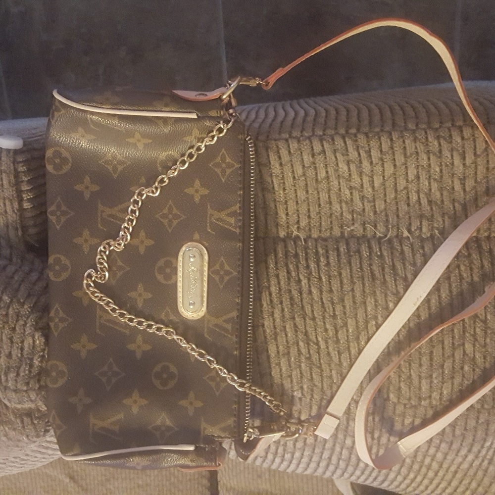 Brown clutch/cross the body bag