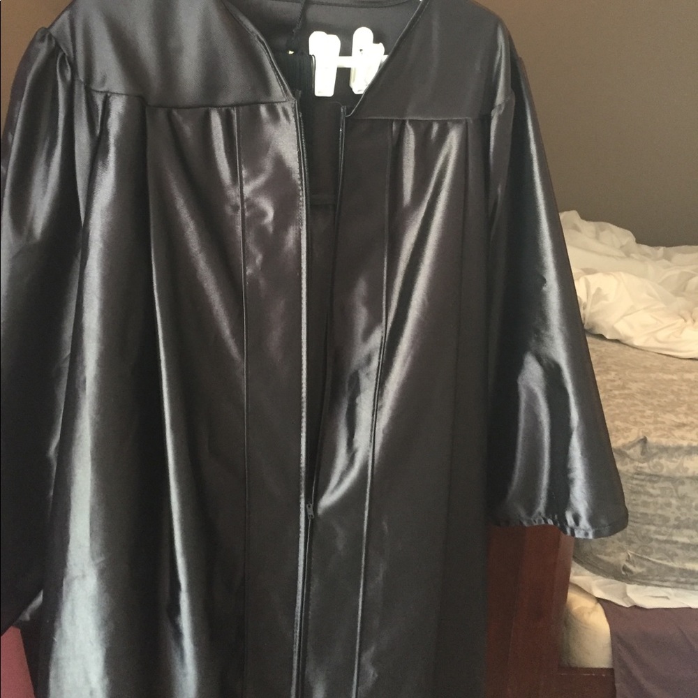Black graduation cap and gown 🎓