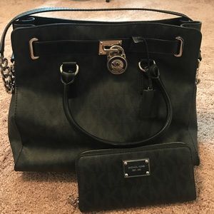 Black Michael Kors purse and matching wallet