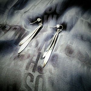 Silver toned twist pendant earrings