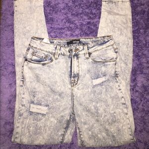 Distressed acid wash jeans
